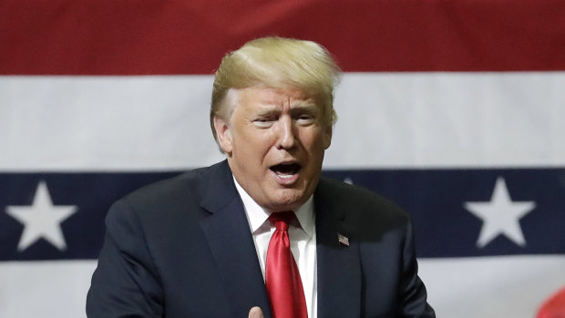 President Donald Trump campaigning at a rally in Tennessee.