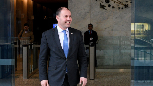 Treasurer Josh Frydenberg leaves after a meeting with Reserve Bank of Australia Governor Philip Lowe.