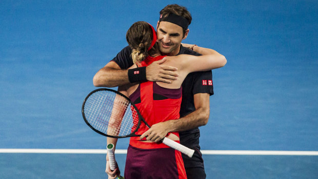 Belinda Bencic and Roger Federer, representing Switzerland, celebrate their mixed doubles win over Great Britain on day 2 of the Hopman Cup in Perth on Sunday.