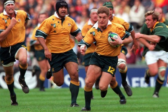 Wallabies centre Tim Horan in action during the 1999 World Cup semi-final. Horan was later named player of the tournament.