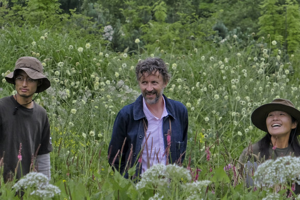 Assistant head gardener Shintaro Sasagawa, Dan Pearson and Midori Shintani in the Meadow Garden.