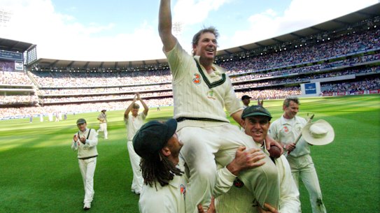 Australia’s Shane Warne is carried on the shoulders of teammates Andrew Symonds and Matthew Hayden in 2006 after his final Test match at the MCG.