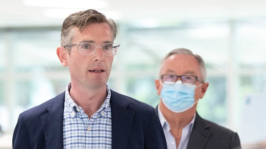 NSW Premier Dominic Perrottet and Health Minister Brad Hazzard address the media on Sunday morning.