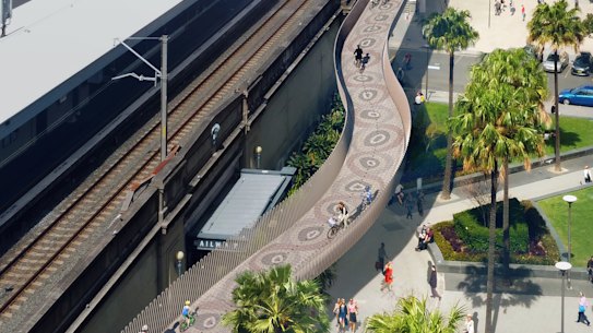 The concept artwork depicting interconnected eels runs the full length of the 200-metre cycleway.