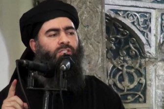 Abu Bakr al-Baghdadi, pictured here in 2014, was "whimpering and crying and screaming" all the way to his death, according to Trump.