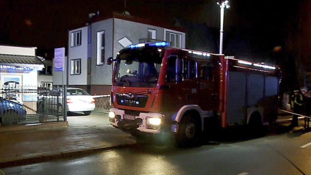 A fire engine stands outside an "Escape Room" game location in Koszalin, northern Poland.