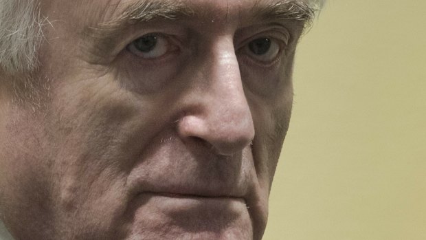 Former Bosnian Serb leader Radovan Karadzic enters the court room of the International Residual Mechanism for Criminal Tribunals in The Hague this week. 