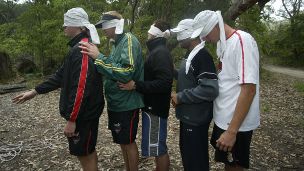 Survive and thrive: Essendon Football Club draft players blindfolder during a camp in the Cann River region in Victoria's far east in 2003.