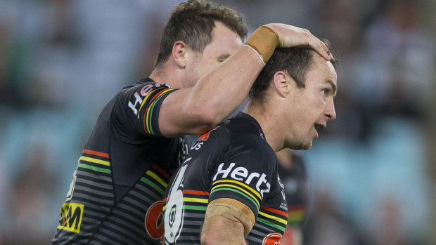Just deserts: James Maloney is congratulated after sinking the Rabbitohs with a field goal.
