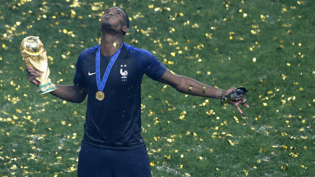 France's Paul Pogba savours victory.