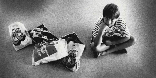 “Minto” sits on the floor of the Lost Child centre with his show bags. March 27, 1988.