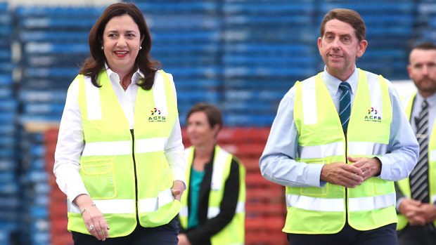 Premier Annastacia Palaszczuk (left) with Treasurer Cameron Dick (right) at an oil refinery near Gladstone on Wednesday.