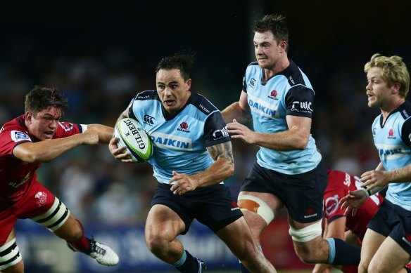 Zac Guildford of the Waratahs makes a break during a Super Rugby match against the Reds at Allianz Stadium in 2016.