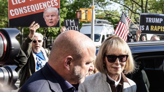 Author E. Jean Carroll, centre arrives to federal court in New York on Tuesday April 25, 2023.