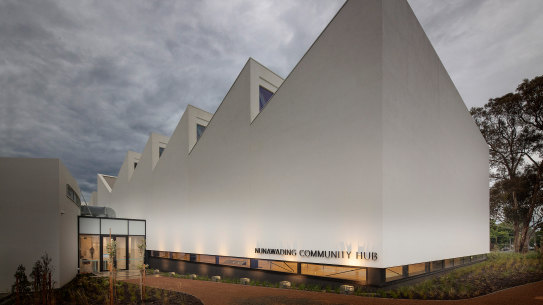 Juxtaposed to the past is a pristine soar-tooth building that accommodates the new basketball court.