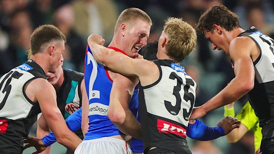 Joe Richards remonstrates with Jacob van Rooyen after the incident with Aliir Aliir.