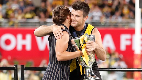 Ash Barty presents the cup to Trent Cotchin of the Tigers after the 2020 Toyota AFL grand final.