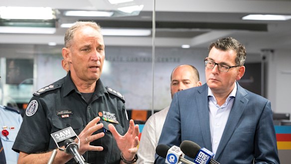 CFA chief officer Steve Warrington flanked by Daniel Andrews.