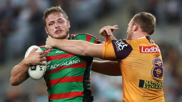 Trading places? George Burgess comes to grips with off-contract Bronco Matt Lodge.