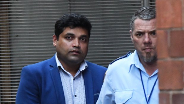 Shahab Ahmed is taken from the NSW Supreme Court in Sydney on Tuesday.
