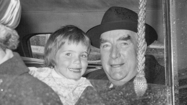 Robert Menzies and his grand daughter Edwina Henderson drive away from London airport in September, 1962.
