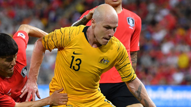 Injury cloud: Socceroos star Aaron Mooy is at long odds to play in the Asian Cup but looks set to be named in coach Graham Arnold's 23-man squad anyway.
