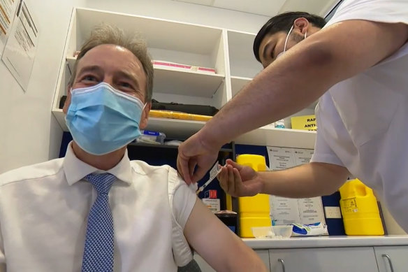 Health Minister Greg Hunt received his COVID-19 booster shot on Sunday.