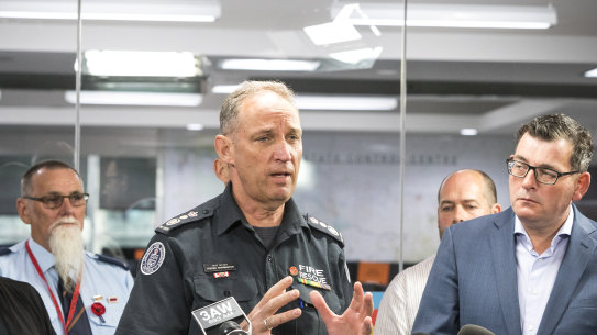 CFA chief officer Steve Warrington with Premier Daniel Andrews in November and Police And Emergency Services Minister Lisa Neville last year.
