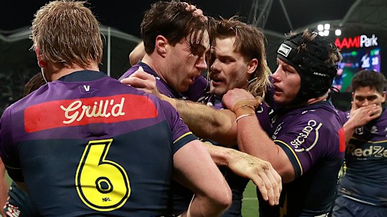 Grant Anderson celebrates a try for Melbourne.