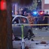 A car is seen on Santa Monica Boulevard where at least 20 people are reported to have been struck.