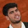 Carlos Alcaraz with the French Open trophy.