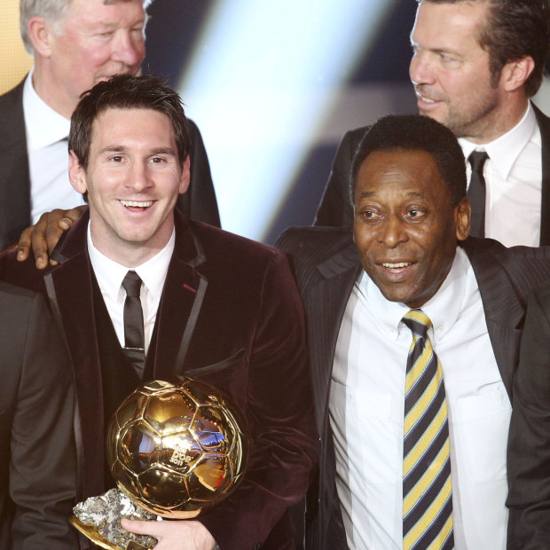 Brazil’s Dani Alves, Argentina’s Lionel Messi, Brazil’s soccer legend Pele and Brazil’s Neymar, from left, stand together after Messi was awarded the prize for the soccer player of the year 2011 at the FIFA Ballon d’Or ceremony in Zurich.