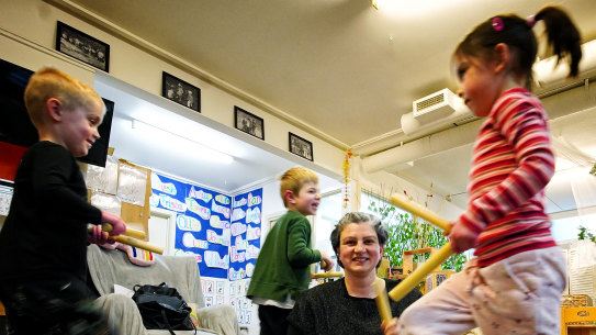 St St Paul’s Anglican Kindergarten teacher Rita Earl with Remy Gibson, Christian Nasiakos and Elly Hocking.