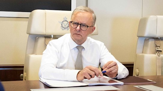 Albanese and Wong talking with senior members of DFAT and the Office of National Intelligence on his way to Tokyo.
