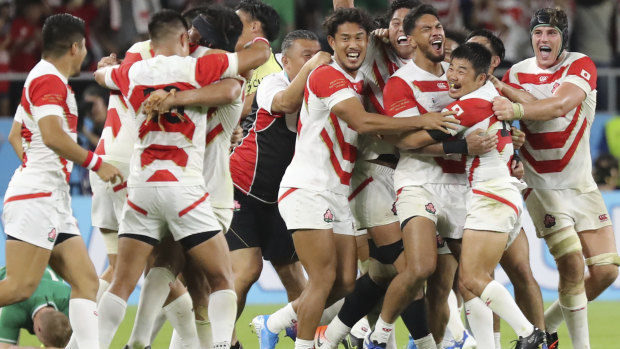 Japan celebrate their shock defeat of Ireland in the World Cup – confirming the host nation's rise in world rugby, though on the basis of scheduling alone, Japan are still a tier-two nation.