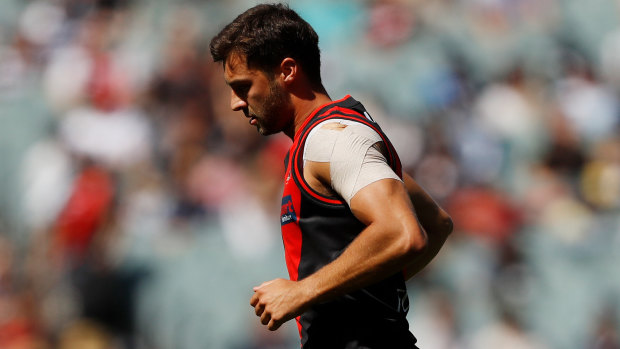 Kyle Langford leaves the field against Geelong in round one after injuring his hamstring.