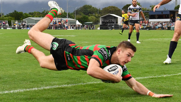 Teen sensation: Campbell Graham dives over for a try.