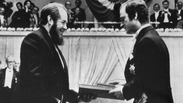 Four years later ... Sweden's King Carl Gustaf presents the 1970 Nobel prize in literature to Alexander Solzhenitsyn in December, 1974.