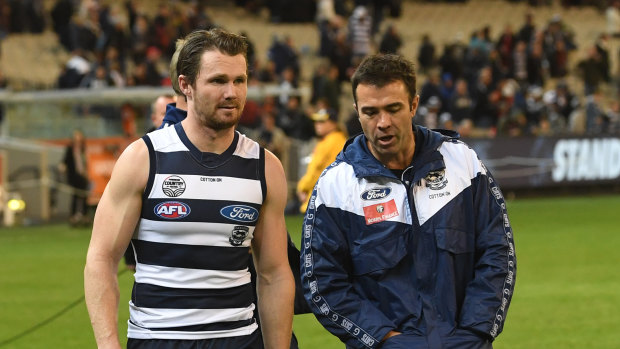 Chris Scott and Patrick Dangerfield walk the MCG earlier this year.