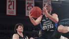 Melbourne United’s Matthew Dellavedova drives to the basket against Adelaide.