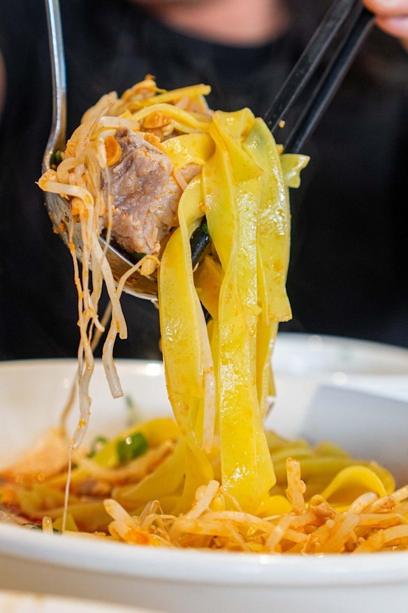 Tumeric dyed noodles.