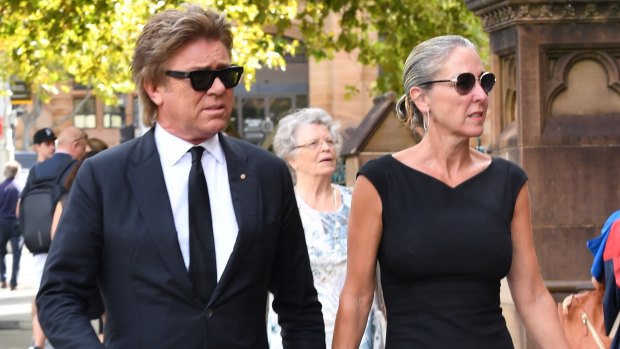 TV presenter Richard Wilkins arrives at the funeral mass for Mike Willesee at St Mary's Cathedral in Sydney on Friday. 