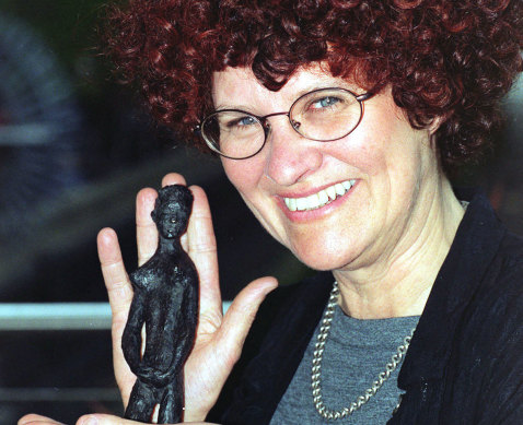 Kate Grenville holds up the Orange Prize for women’s fiction, which she won in 2001 for her novel The Idea of Perfection.