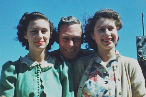Princess Margaret and Princess Elizabeth with  King George VI in 1947.