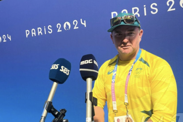 Australian swimming coach Michael Palfrey addresses South Korean media ahead of the Olympics in Paris.