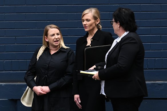 Agronomist Lauren Marchant (left) and veterinarian Ainslee Munro (centre) outside the NSW District Court in October.