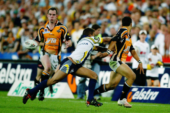 That pass: Benji Marshall flicks the ball inside to Pat Richards during the 2005 grand final.