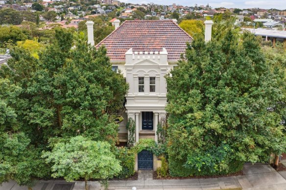 The Victorian Italianate manor of Craig and Kate Smith sold before its scheduled auction for $14.7 million.