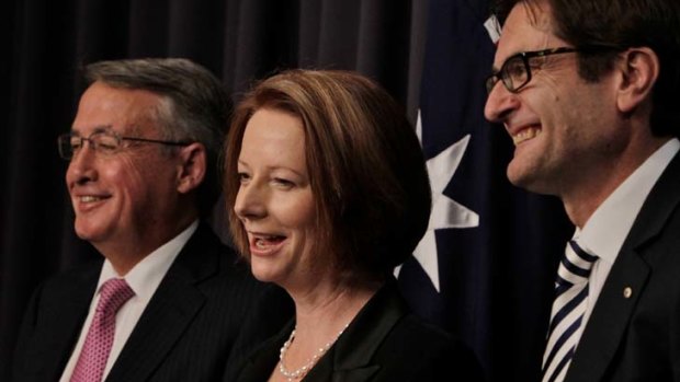 In government: Wayne Swan and Greg Combet with then Prime Minister Julia Gillard.