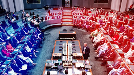 Labor MPs (red) in the House of Representatives now stretch across the aisle, while the Coalition (blue) are a hugely reduced opposition.